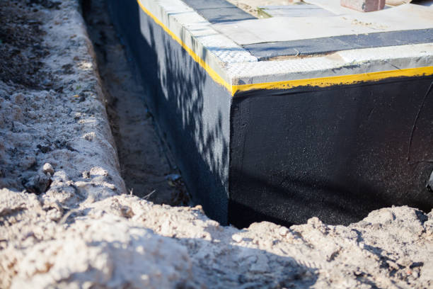 Professional Exterior Waterproofing technician working in Kingston, OH